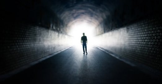 guy in dark tunnel